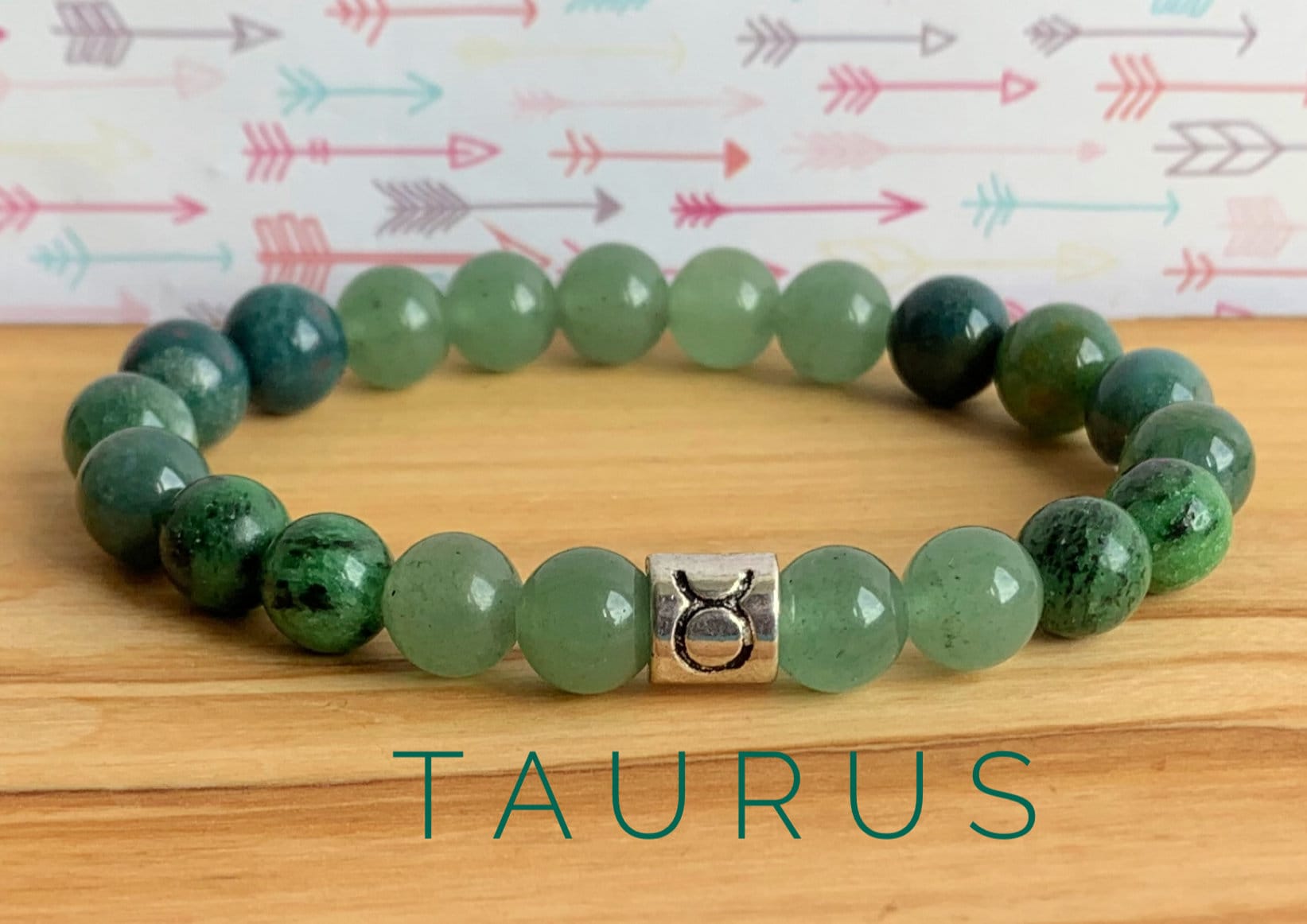 taurus gemstone bracelet with green aventurine crystals and taurus charm